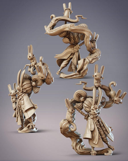 three distinct sculptures of fantastical creatures, including a rabbit-like figure, a dragon-like creature, and a rabbit-like creature with a human-like face.