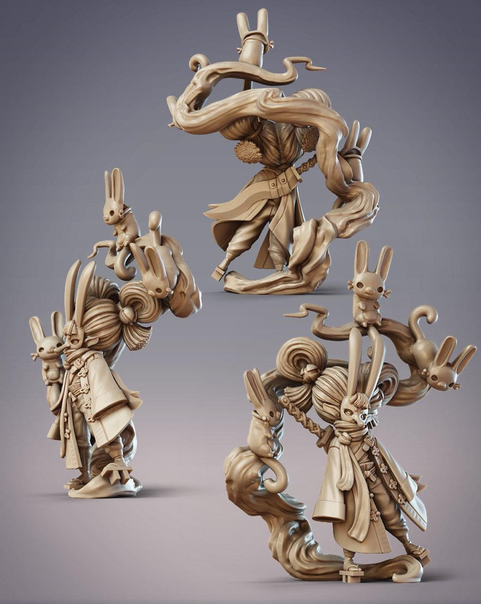 three distinct sculptures of fantastical creatures, including a rabbit-like figure, a dragon-like creature, and a rabbit-like creature with a human-like face.