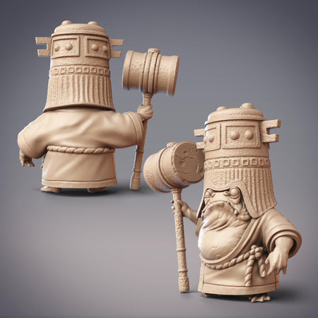 two figurines, each holding a hammer, against a gray background.