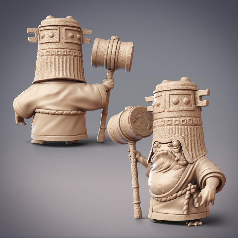 two figurines, each holding a hammer, against a gray background.