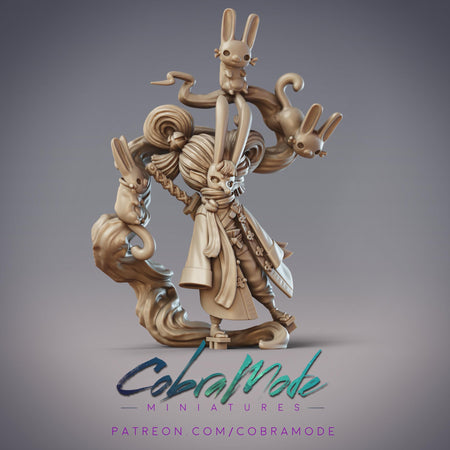 The image is a 3D model of a character with a unique design, featuring a combination of rabbit-like elements and other fantastical features. The character appears to be a miniature figure, possibly representing a fantasy or science fiction theme.